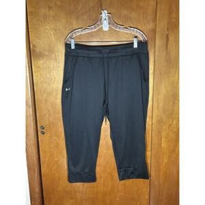 Under Armour Women's Tech Capri pants, featuring quick-drying fabric Sz XL